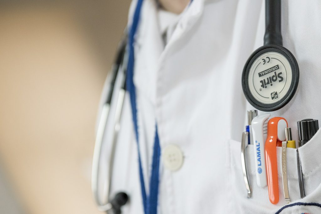 Doctor with stethoscope around neck